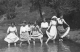 Hildred and her friends wading (1913)