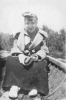 Hildred Thurow in boat at summer camp (1915)